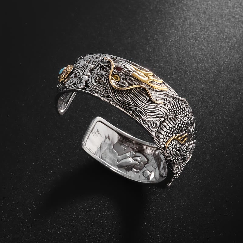 WorldNorse Geschnitztes offenes Armband mit Drachen- und Tiermotiv „Domineer“