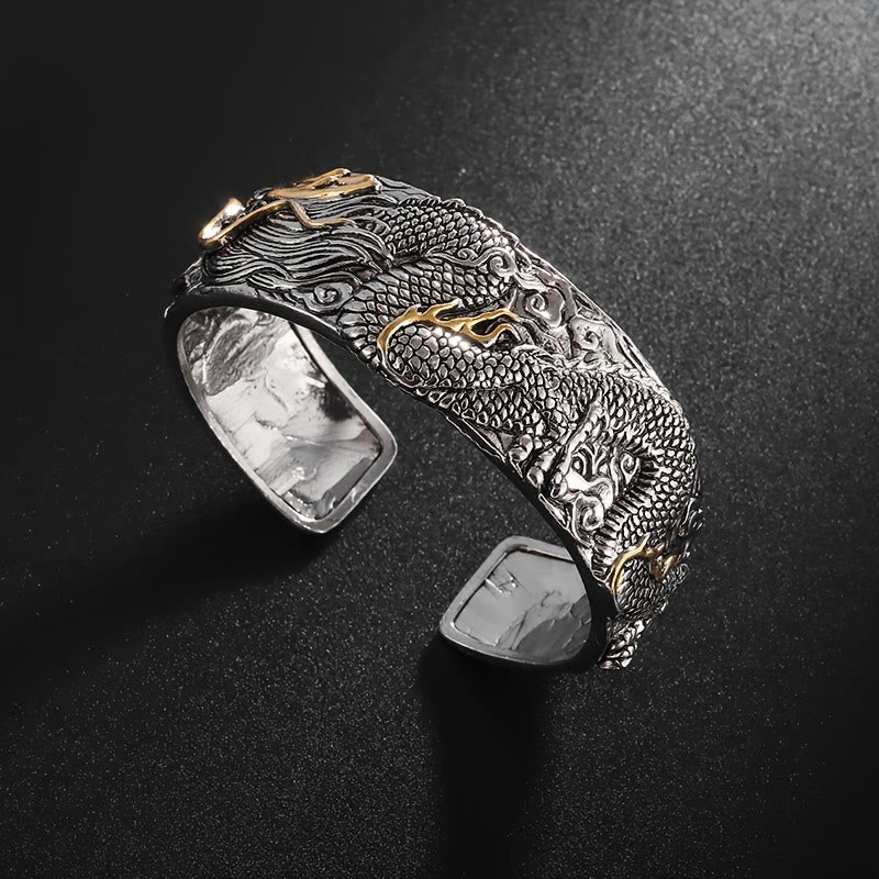 WorldNorse Geschnitztes offenes Armband mit Drachen- und Tiermotiv „Domineer“