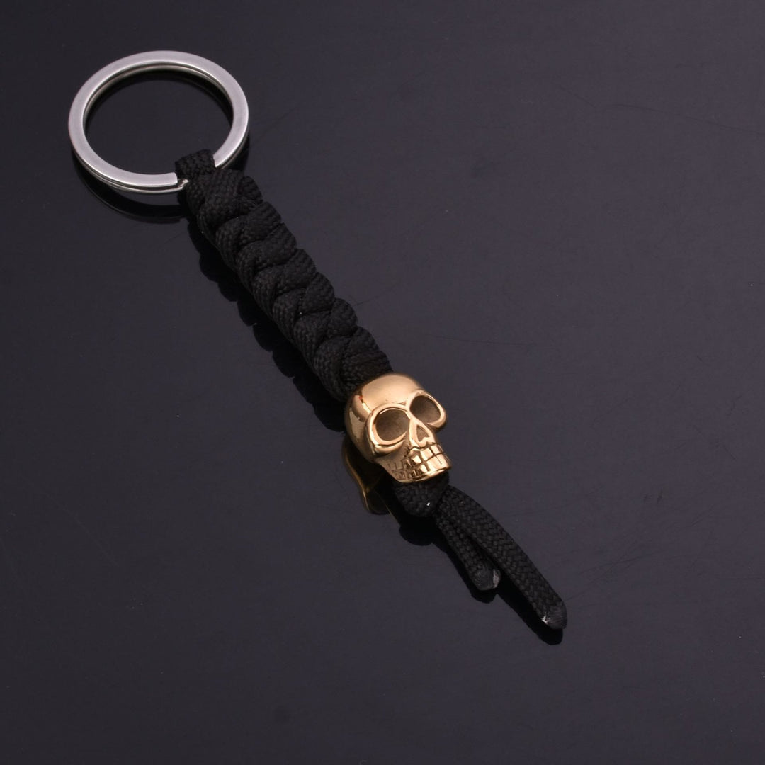 WorldNorse Totenkopf Fallschirmseil Schlüsselanhänger - Gold - image 1