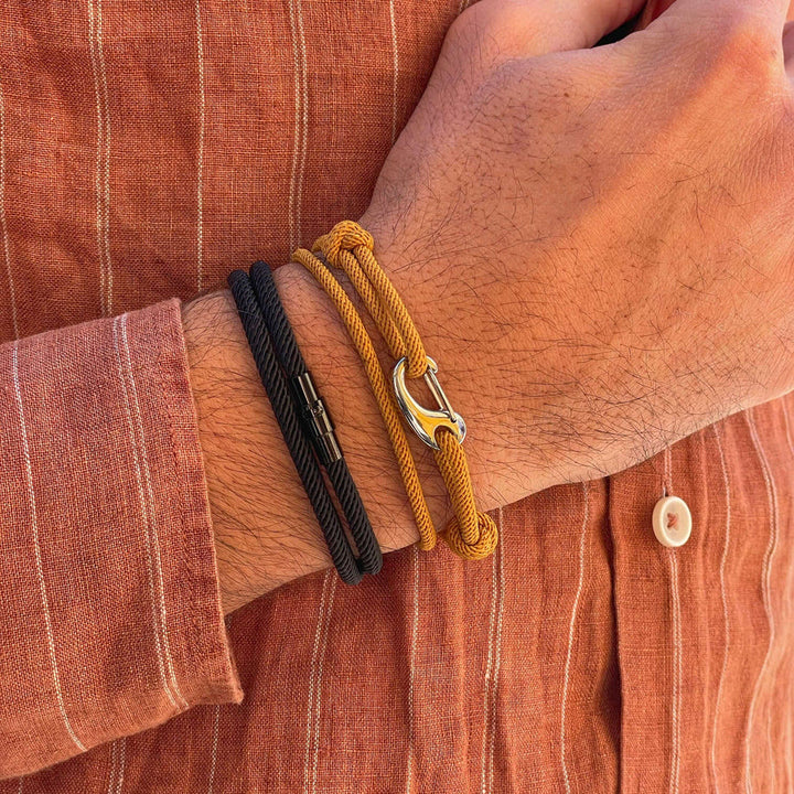 WorldNorse Minimalistisches geflochtenes Armband aus Edelstahl mit Magnetverschluss - image 1