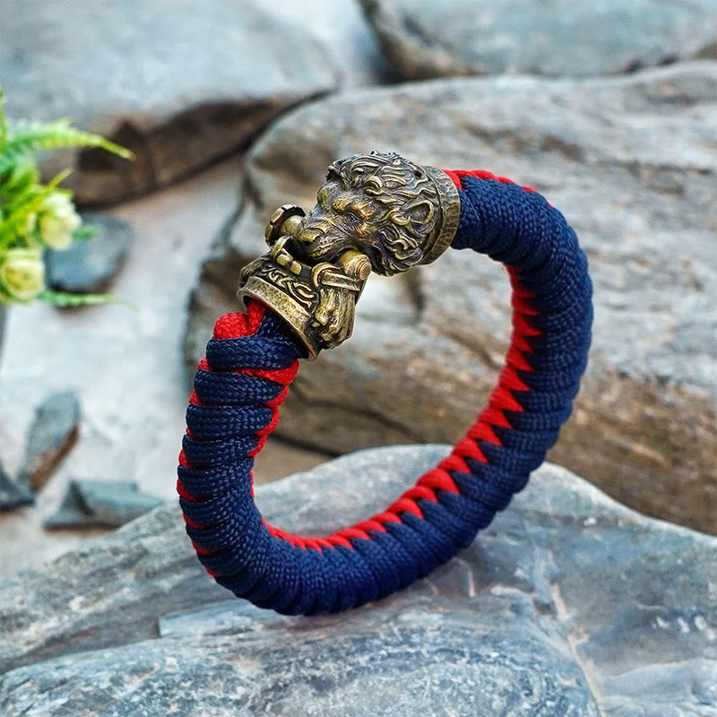 WorldNorse Vintage-Armband mit Löwenkopf-Paracord, geflochten - Blau & Rot - Innenumfang: 24 cm (Gesamtlänge 28 cm) - image 0