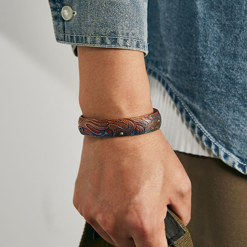 WorldNorse Handgefertigtes Armband mit gravierter Feder aus 999 Gold - image 1