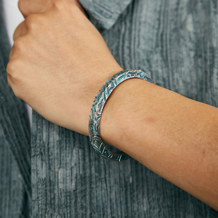 WorldNorse Handgefertigtes Armband aus 999er Silber mit Türkis und verzauberter Ranke - image 1