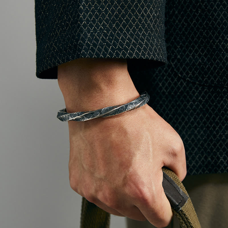 WorldNorse Handgefertigtes Armband aus 999er Silber mit gravierter Münze - image 1