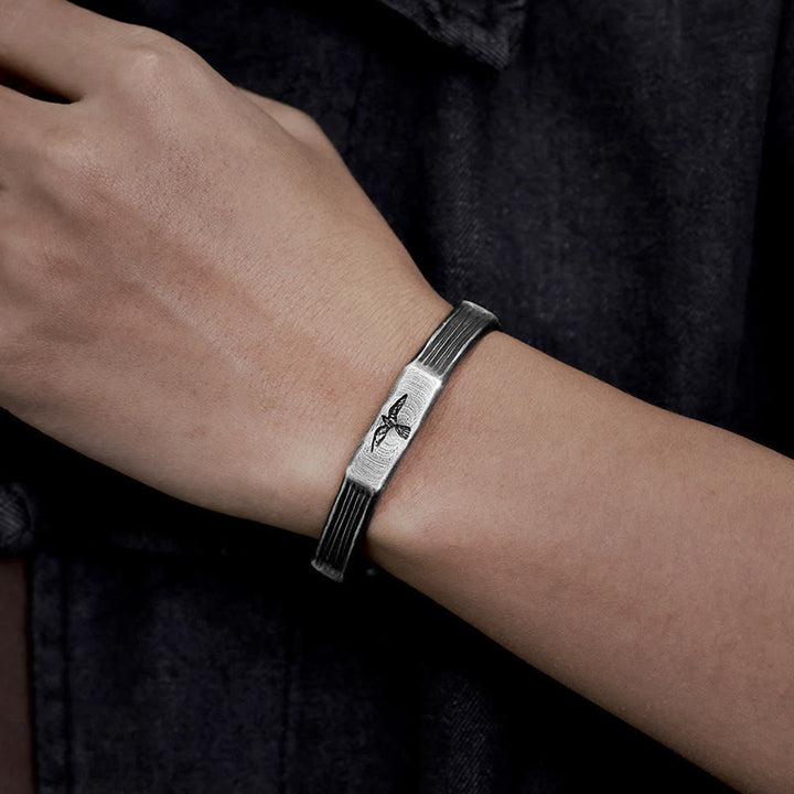 WorldNorse Handgefertigtes Armband aus 999er Silber mit Wikinger- Raven - image 1