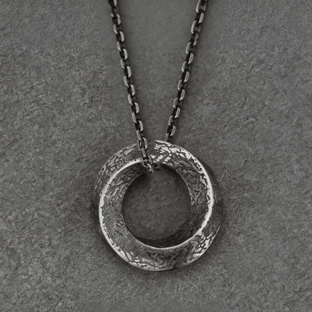 Handgefertigte Möbiusband-Halskette aus 999er Silber von WorldNorse - 55 cm lange Titanstahlkette - image 1