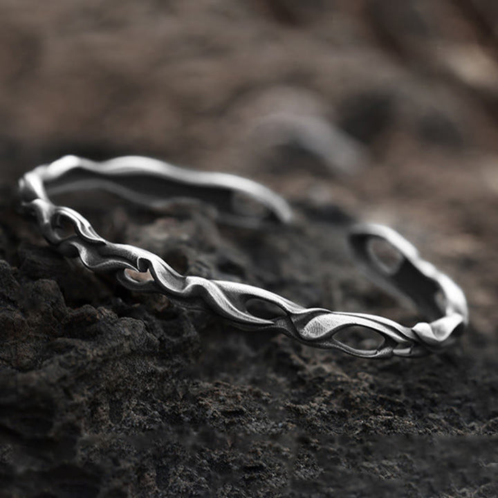 WorldNorse Handgefertigtes Armband aus 999er Silber mit gedrehter Flammenform und Hohlprofil - image 4